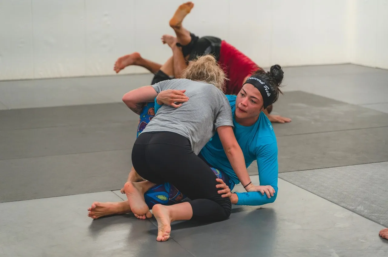 Competitive wrestling training at Reizen MMA